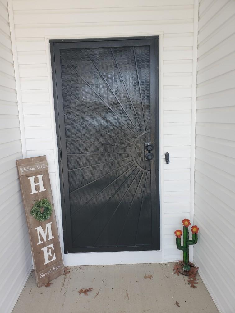 Custom Sunburst Security Door at Front Entry
