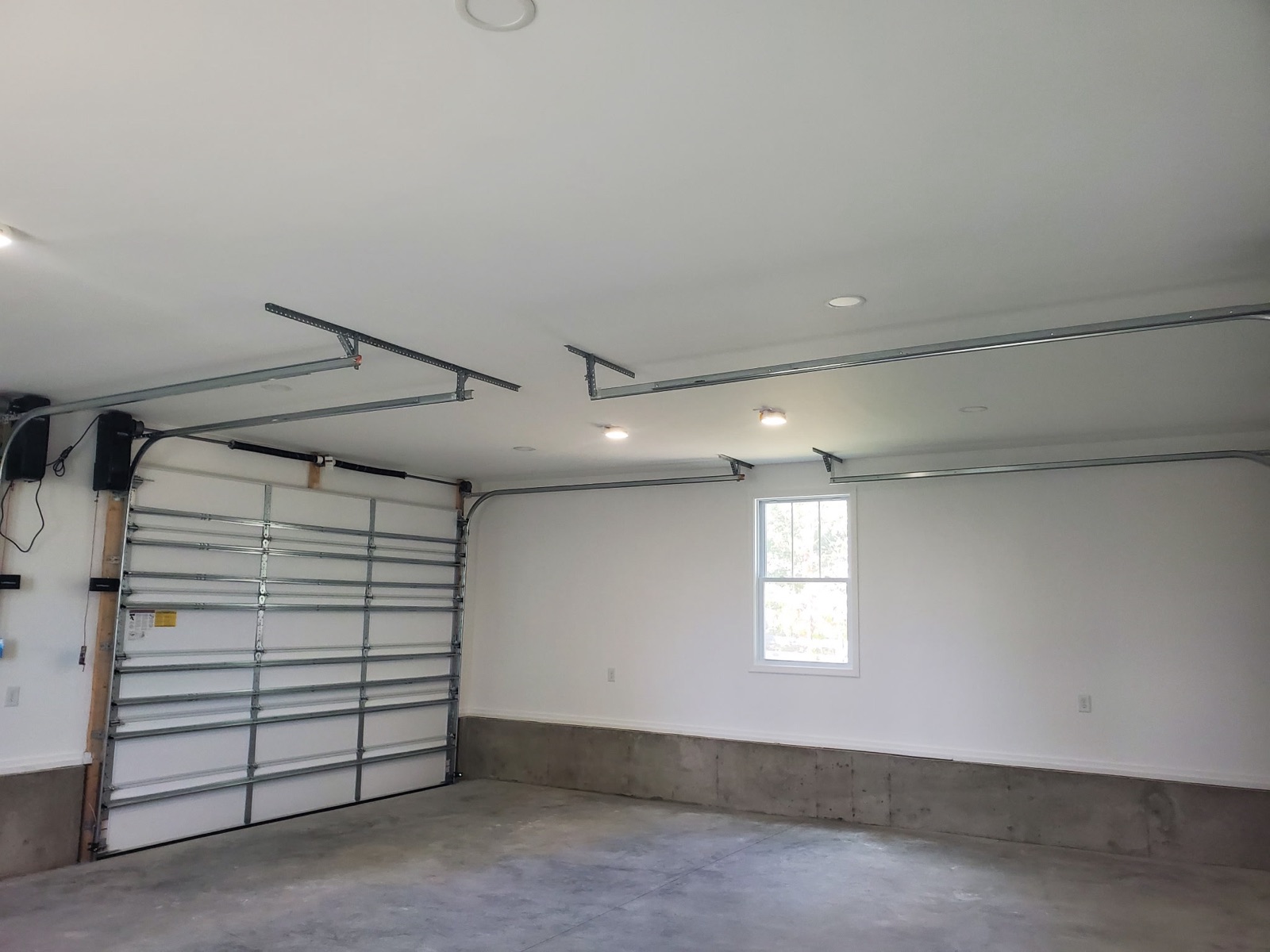 Finished garage interior with recessed lighting - Bradie's Custom Construction, Fredericksburg VA