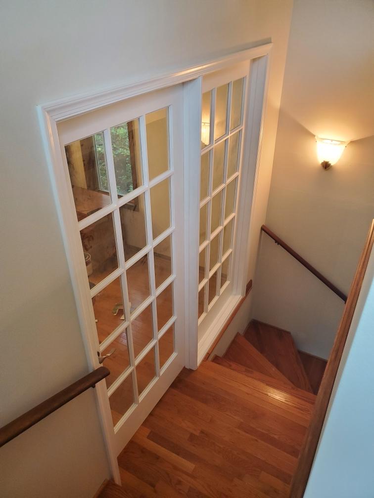 French doors over refinished oak stairwell - Bradie's Custom Construction, Fredericksburg VA
