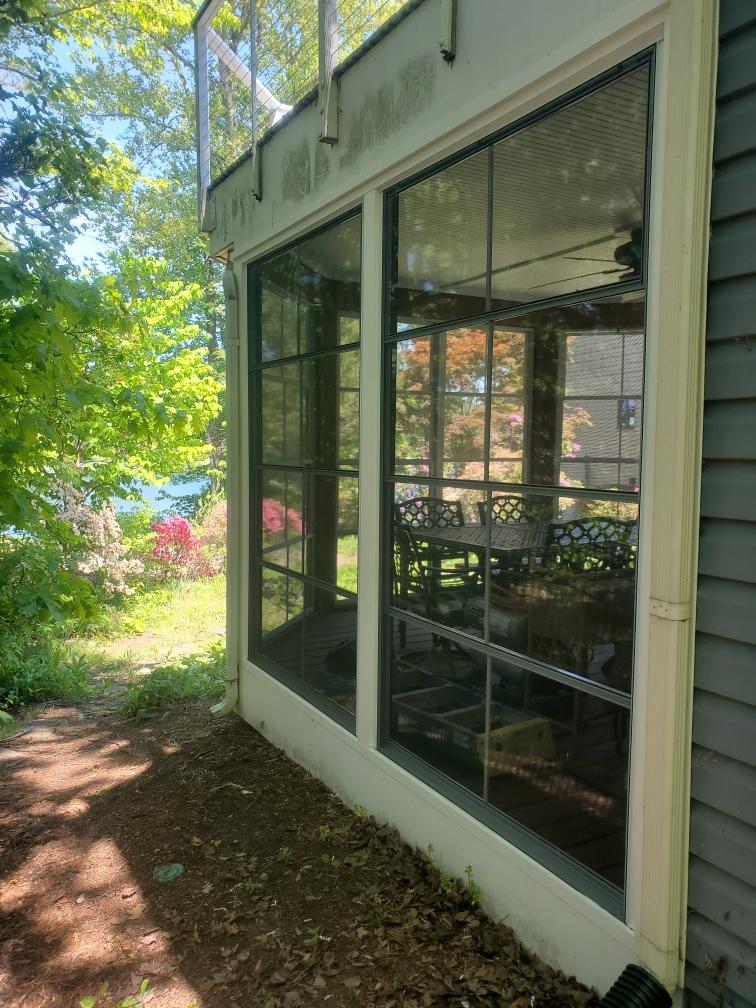 Lakeside Sunroom with Bay Windows