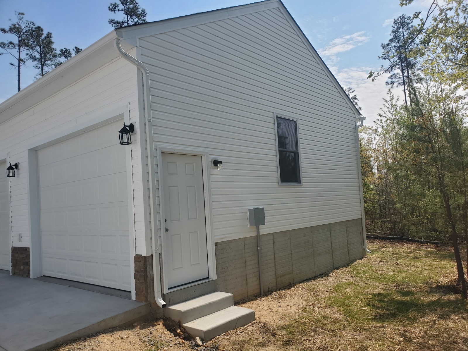 Garage side entry door with concrete steps - Bradie's Custom Construction, Fredericksburg VA