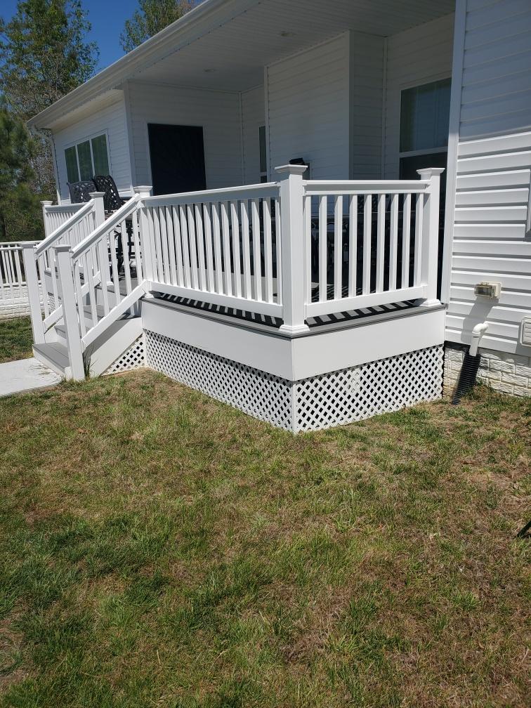 White vinyl deck with lattice skirting - Bradie's Custom Construction, Fredericksburg VA